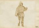 Image of Tom McCue, crew member returning from hunting with white fox. [dupe of BL(W)-45]